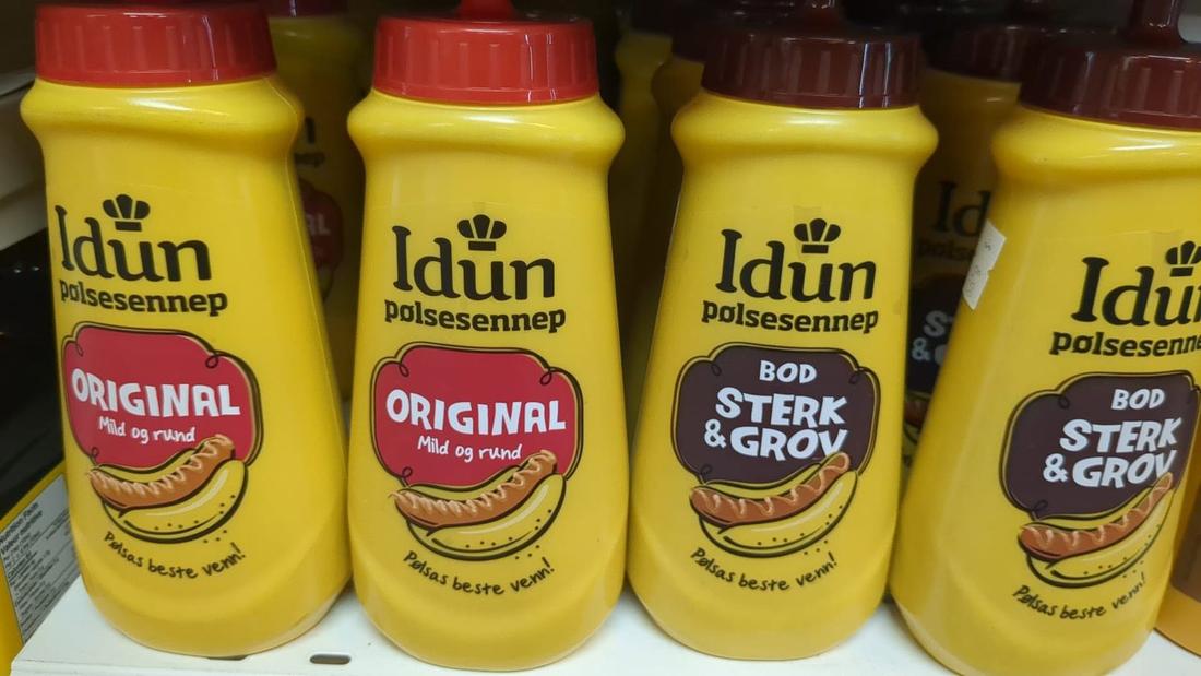 Bottles of Idun p&oslash;lsesennep Norwegian hot dog mustard at Hansel Deli in Surrey BC